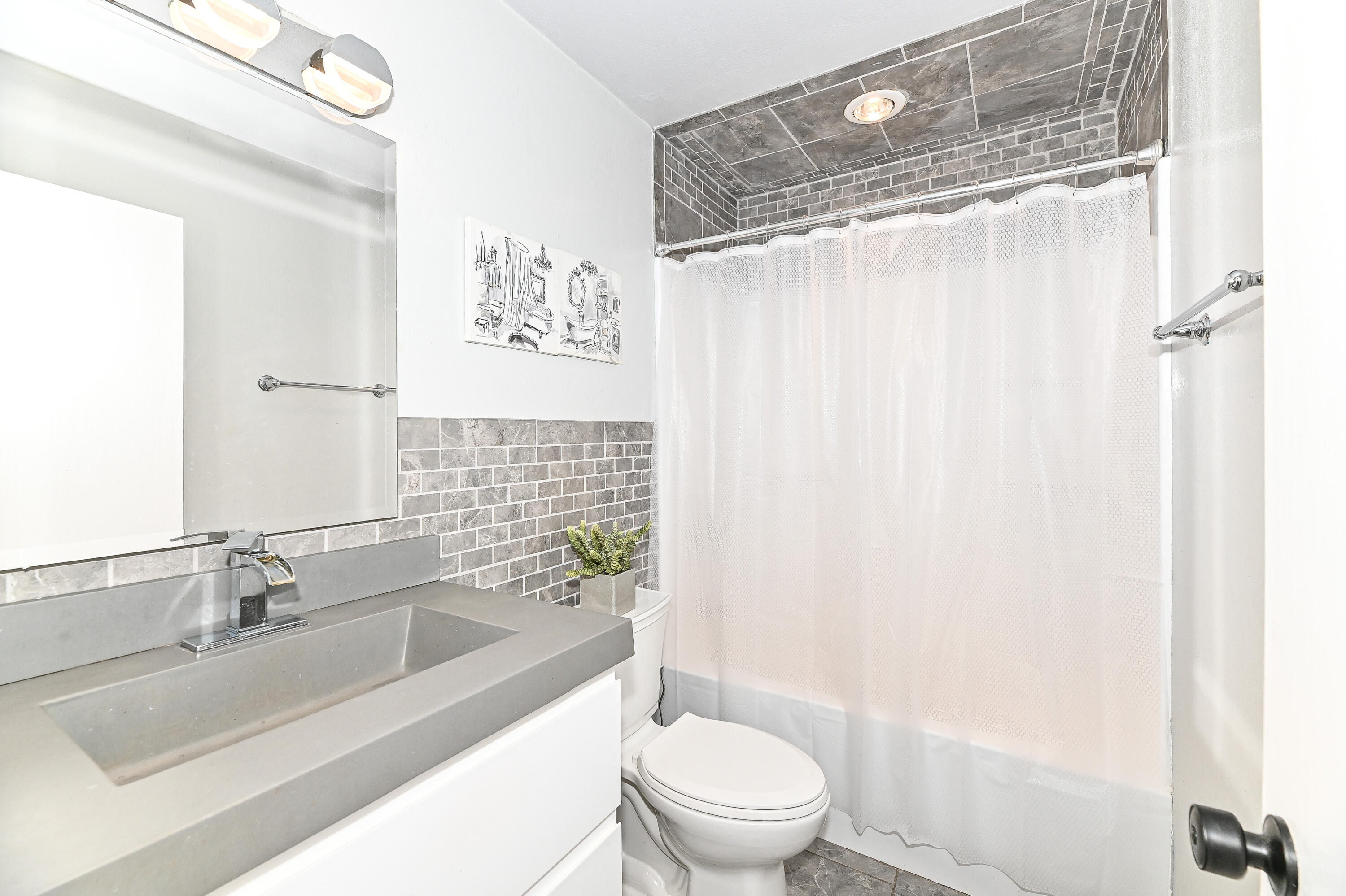 11926 West Mill Road, Unit 4 Milwaukee, WI 53225 - Photo 16 of 40 Completely remodeled full bath upstairs