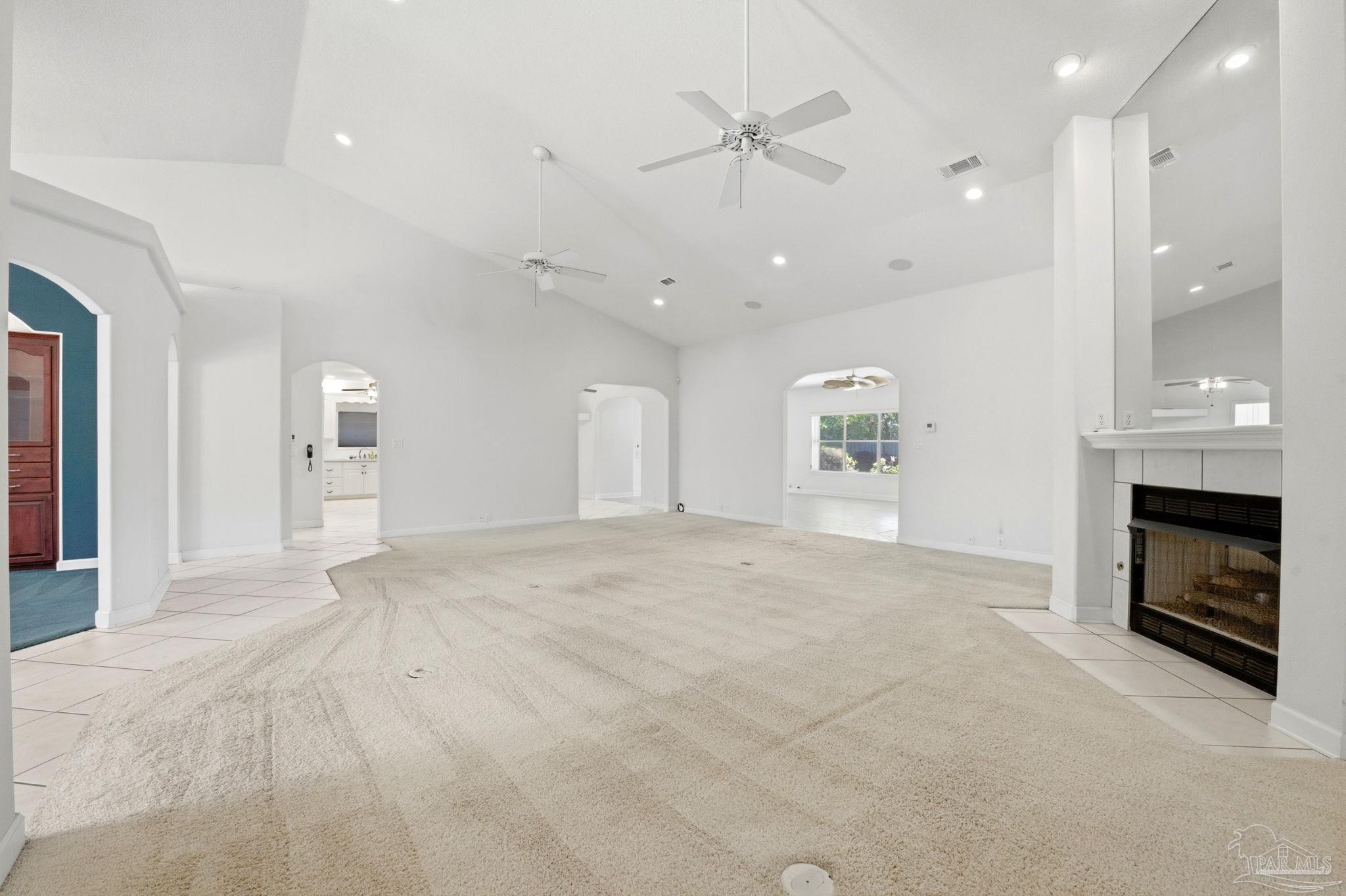 4552 Peaden Road Pace, FL 32571 - Photo 13 of 38 a view of an empty room with a fireplace