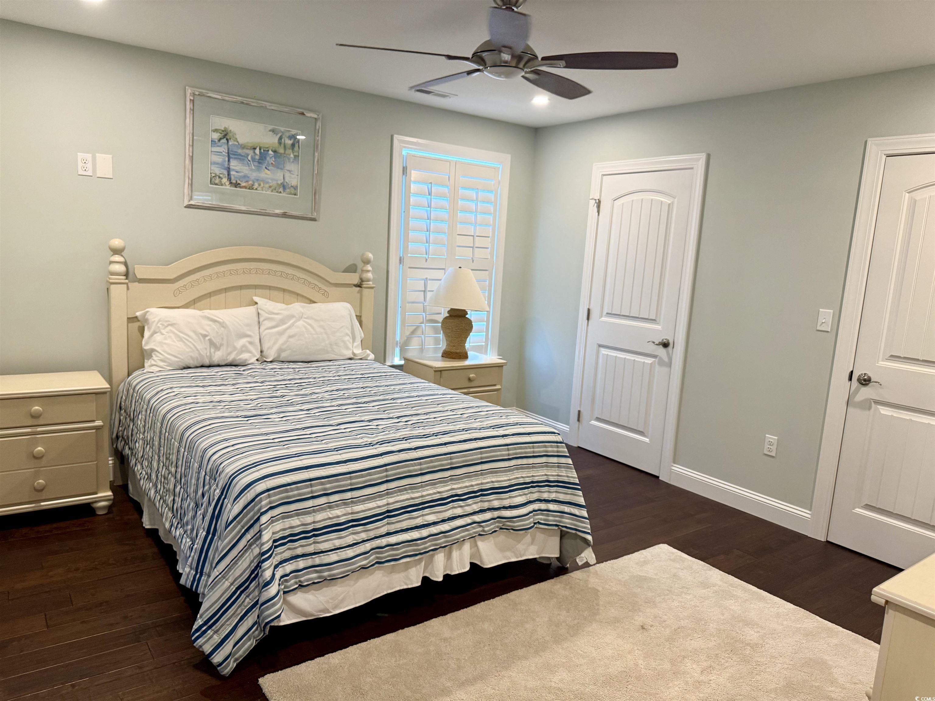 100 Oak Bay Drive Georgetown, SC 29440 - Photo 14 of 29 Bedroom featuring dark wood-type flooring, ceiling fan, and recessed lighting