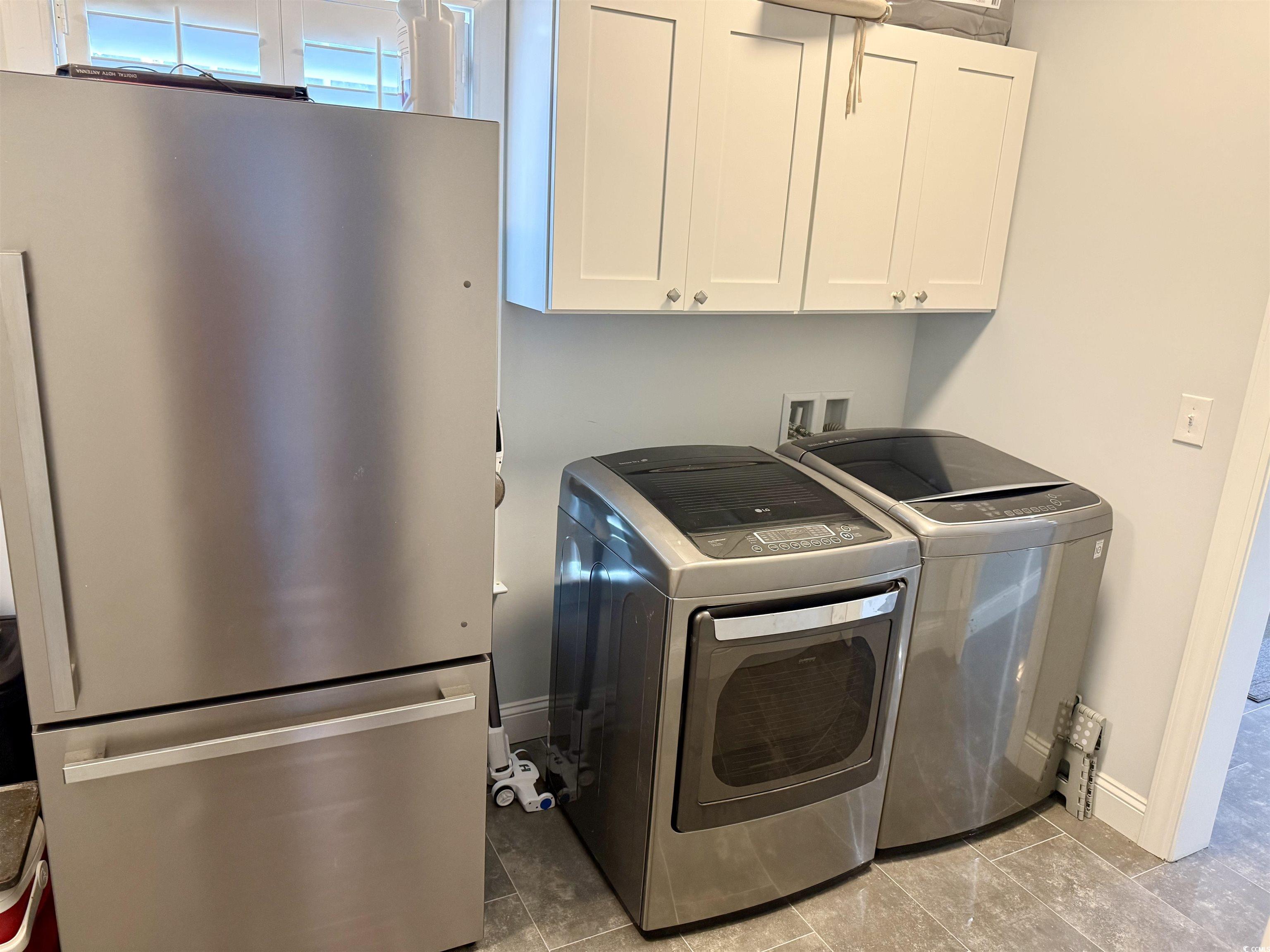 100 Oak Bay Drive Georgetown, SC 29440 - Photo 14 of 33 Laundry room with washing machine and dryer and baseboards