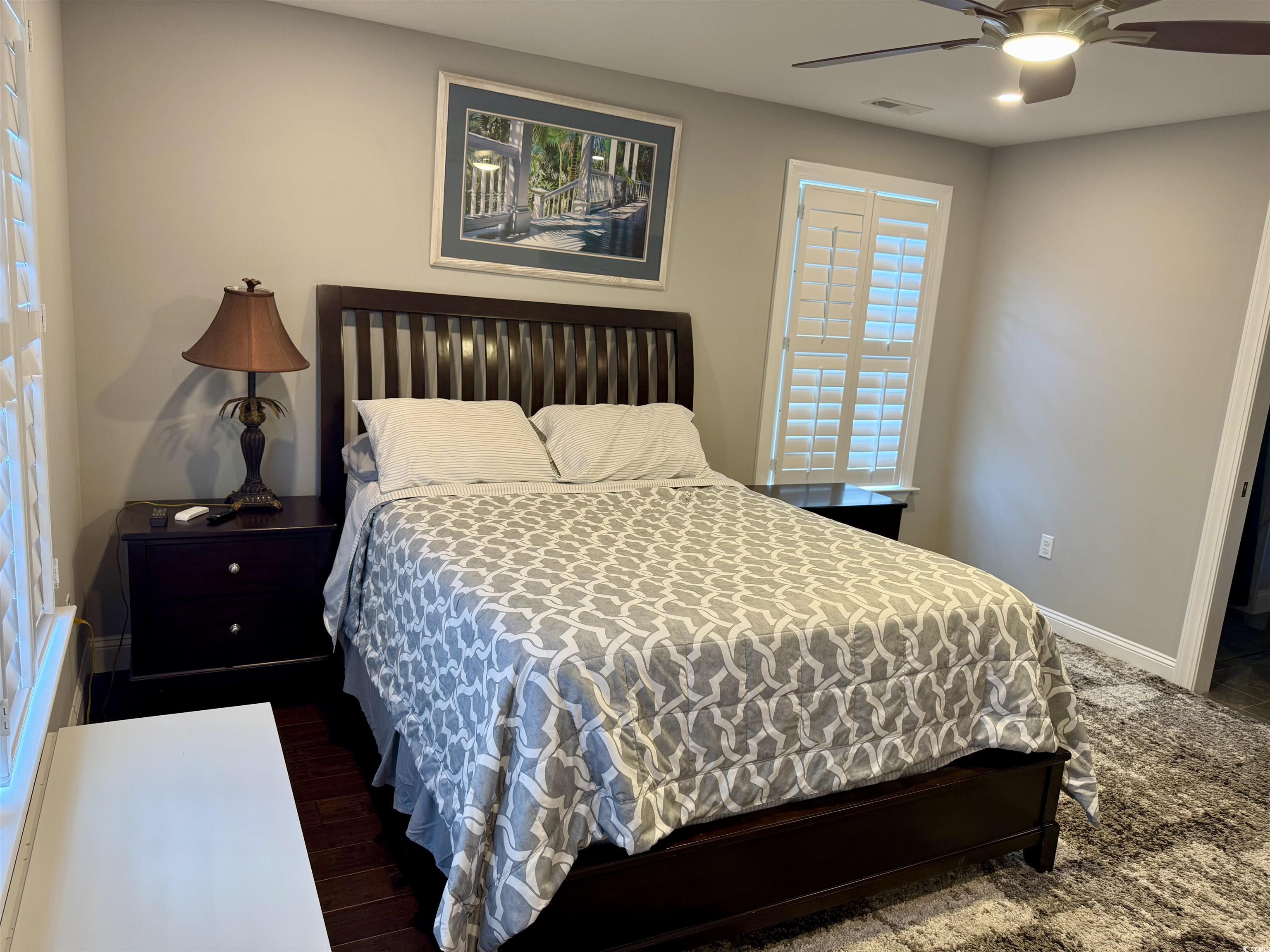 100 Oak Bay Drive Georgetown, SC 29440 - Photo 18 of 33 Bedroom with baseboards and ceiling fan