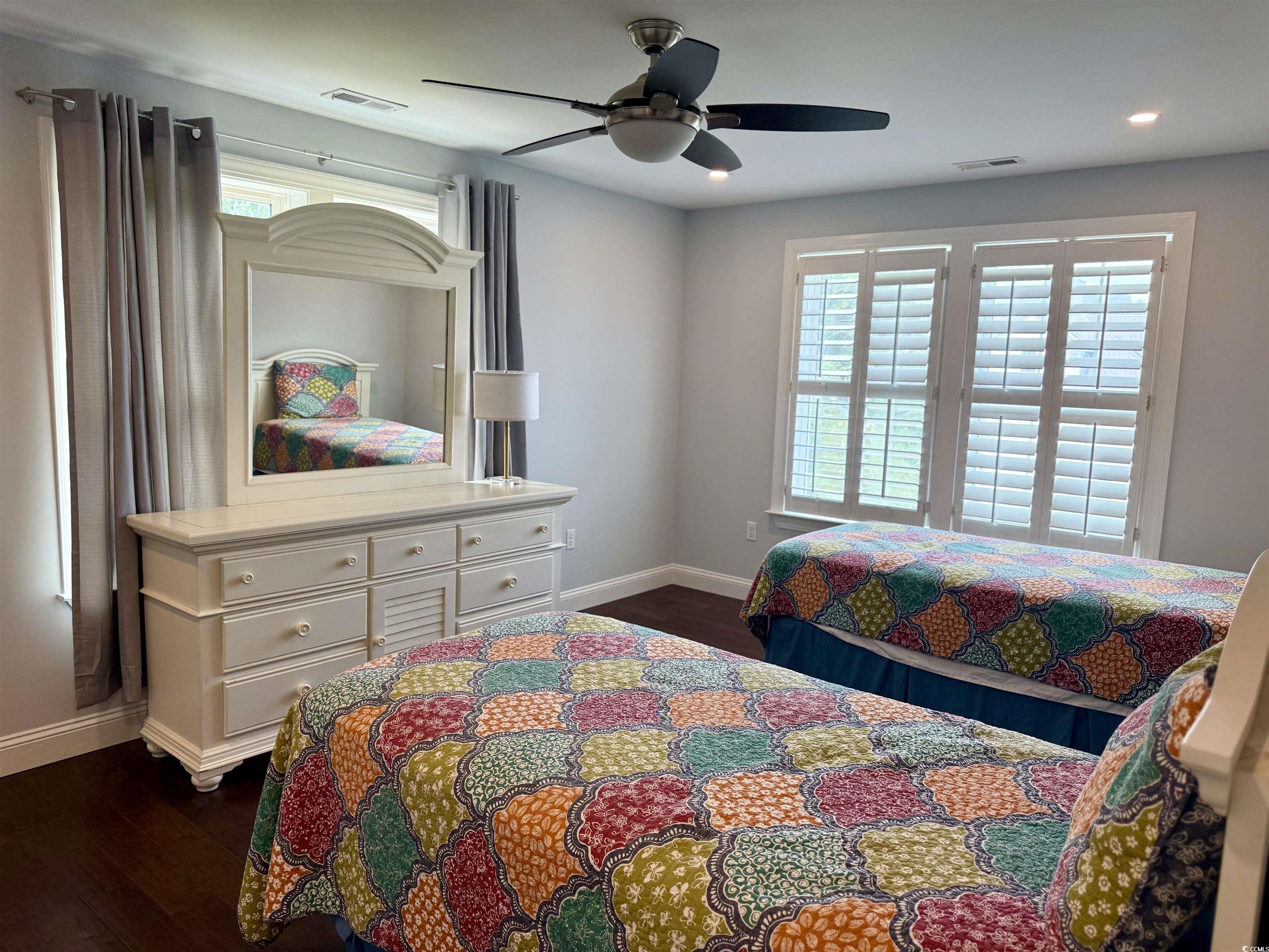 100 Oak Bay Drive Georgetown, SC 29440 - Photo 19 of 29 Bedroom with dark wood finished floors, ceiling fan, and recessed lighting