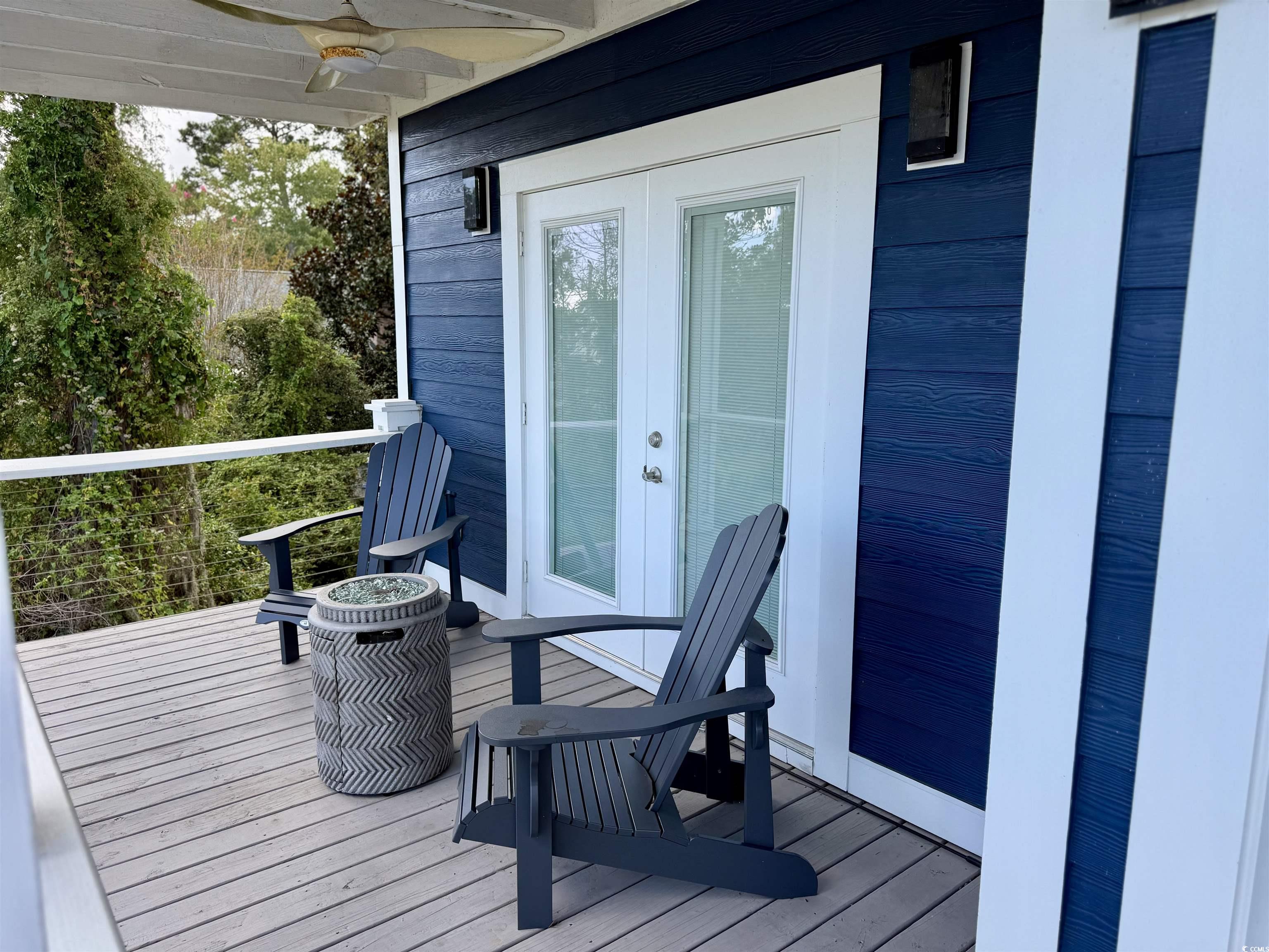 100 Oak Bay Drive Georgetown, SC 29440 - Photo 25 of 29 Deck with ceiling fan and french doors