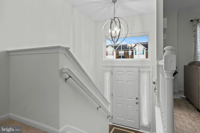 a view of entryway and chandelier