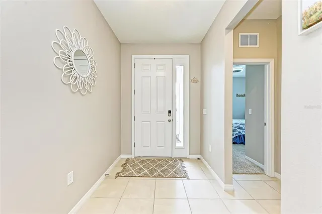 a very nice looking room with a glass door shower and a mirror