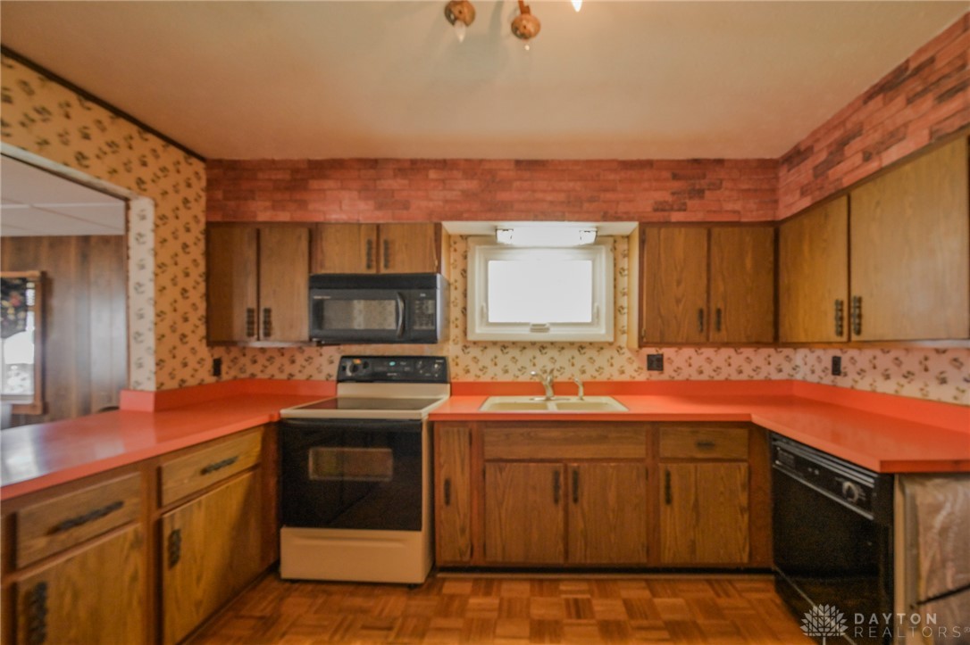 3057 Springfield Xenia Road Springfield, OH 45506 - Photo 14 of 37 This kitchen features a bright ambiance, practical layout, and ample storage.