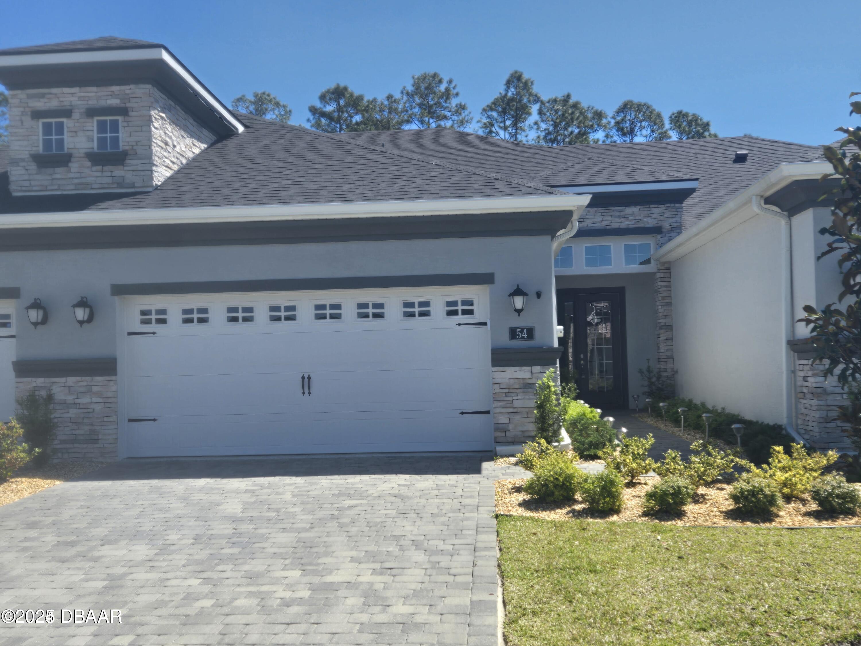 54 Longridge Lane Ormond Beach, FL 32174 - Photo 1 of 16 a front view of a house