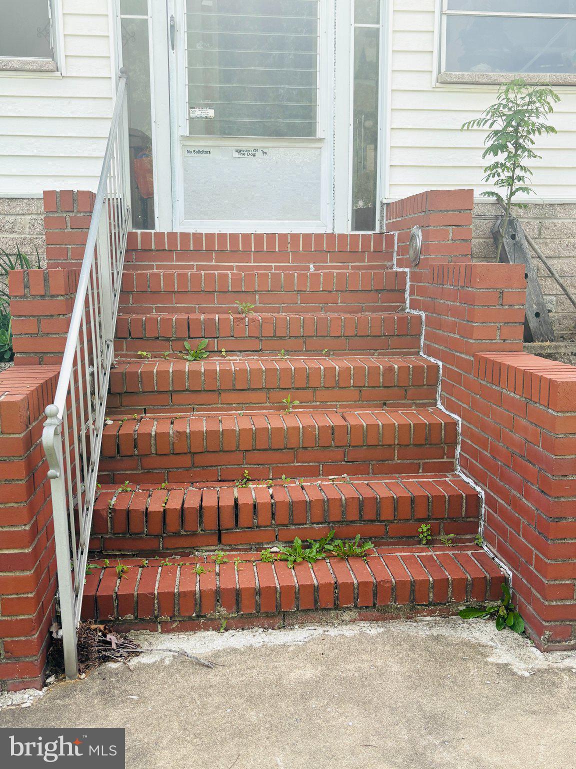 1621 Rosewick Avenue Rosedale, MD 21237 - Photo 5 of 37 Charming brick steps with greenery.