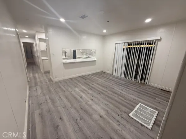 a view of livingroom with furniture and wooden floor