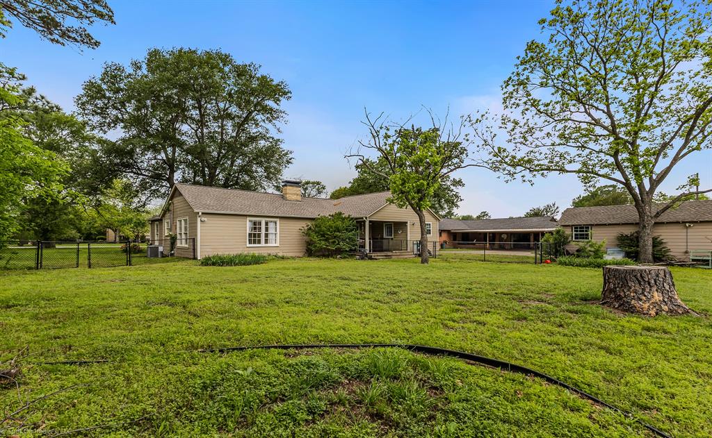 914 Griffith Avenue Terrell, TX 75160 - Photo 25 of 32 a front view of a house with a garden