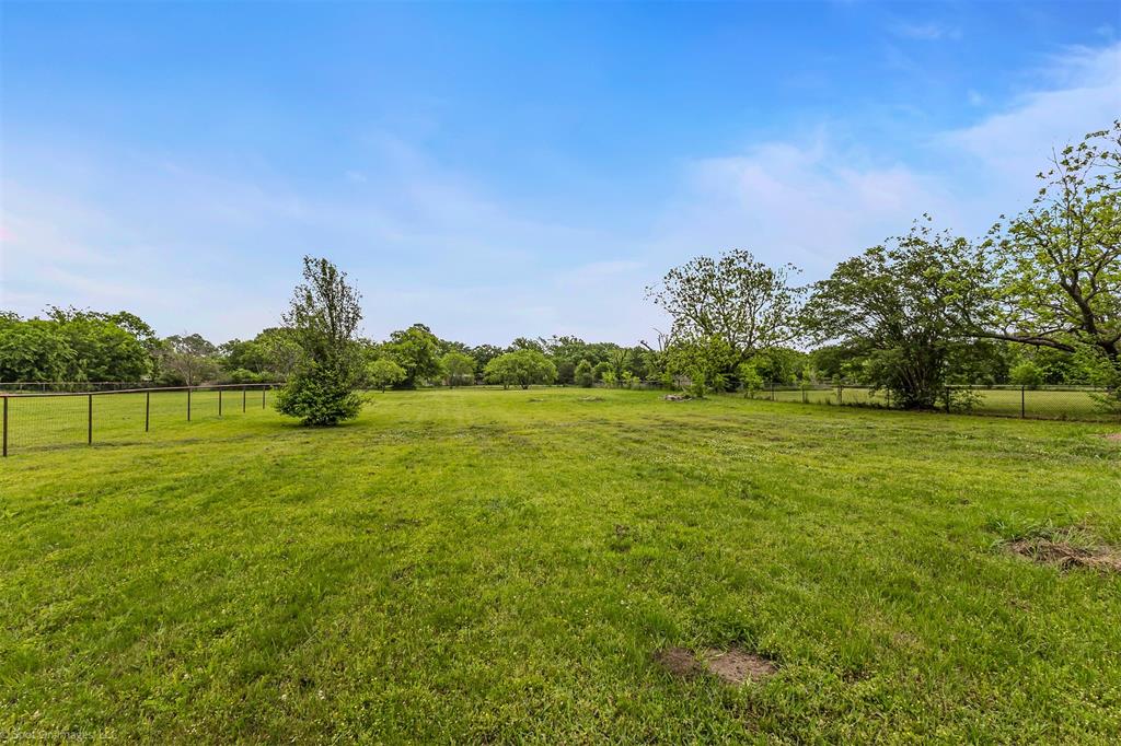914 Griffith Avenue Terrell, TX 75160 - Photo 27 of 32 a view of a field with grass and trees