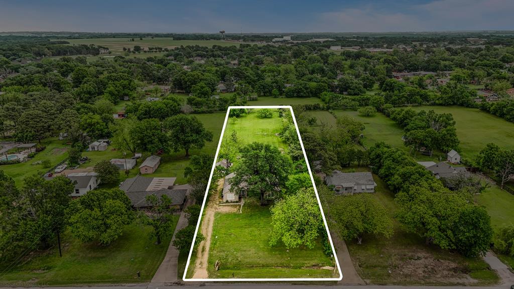 914 Griffith Avenue Terrell, TX 75160 - Photo 4 of 32 an aerial view of residential houses with outdoor space