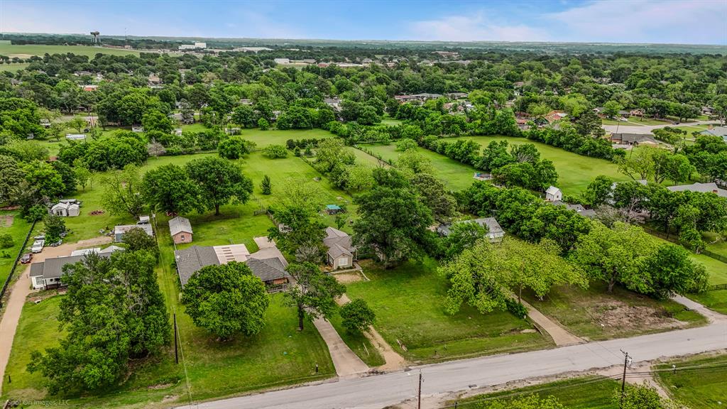 914 Griffith Avenue Terrell, TX 75160 - Photo 6 of 32 an aerial view of residential houses with outdoor space and trees