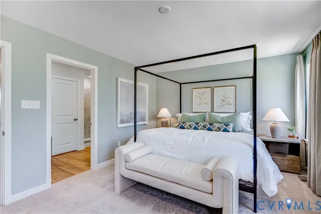 a living room with a couch and a view of living room