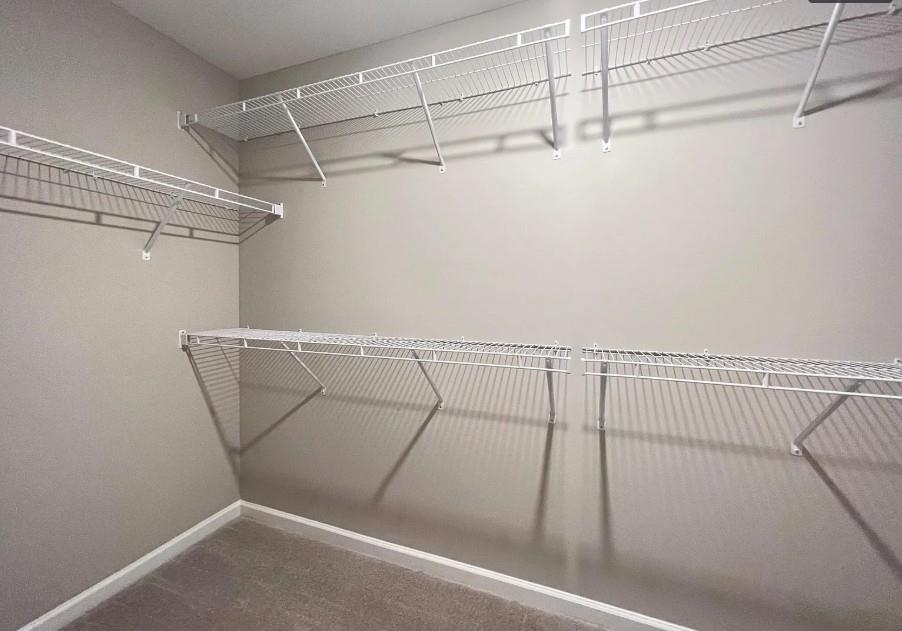 140 Golden Eagle Parkway Braselton, GA 30517 - Photo 11 of 13 a view of a room with racks on the wall