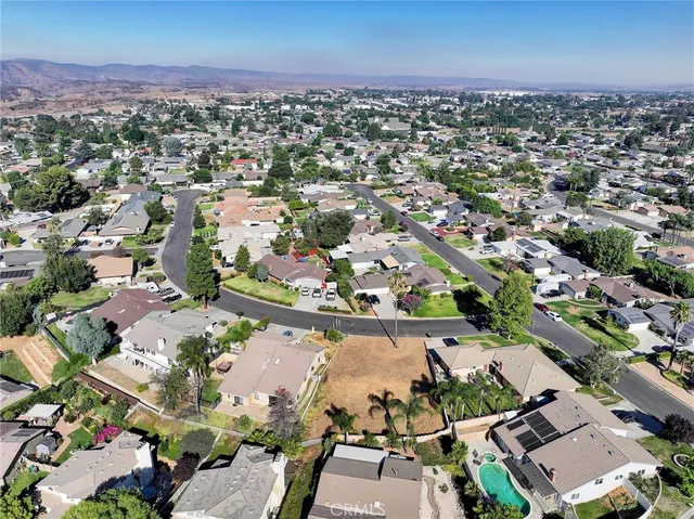 an aerial view of a city with lots of residential buildings
