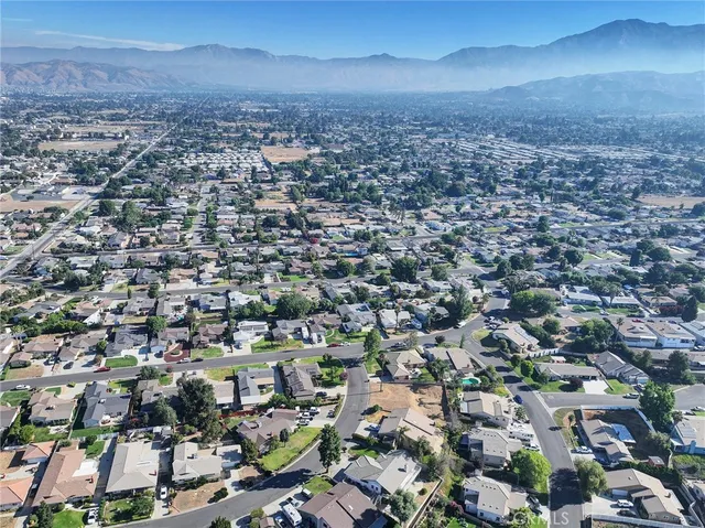 an aerial view of residential house and outdoor space