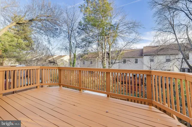 a view of deck with wooden floor and fence and floor