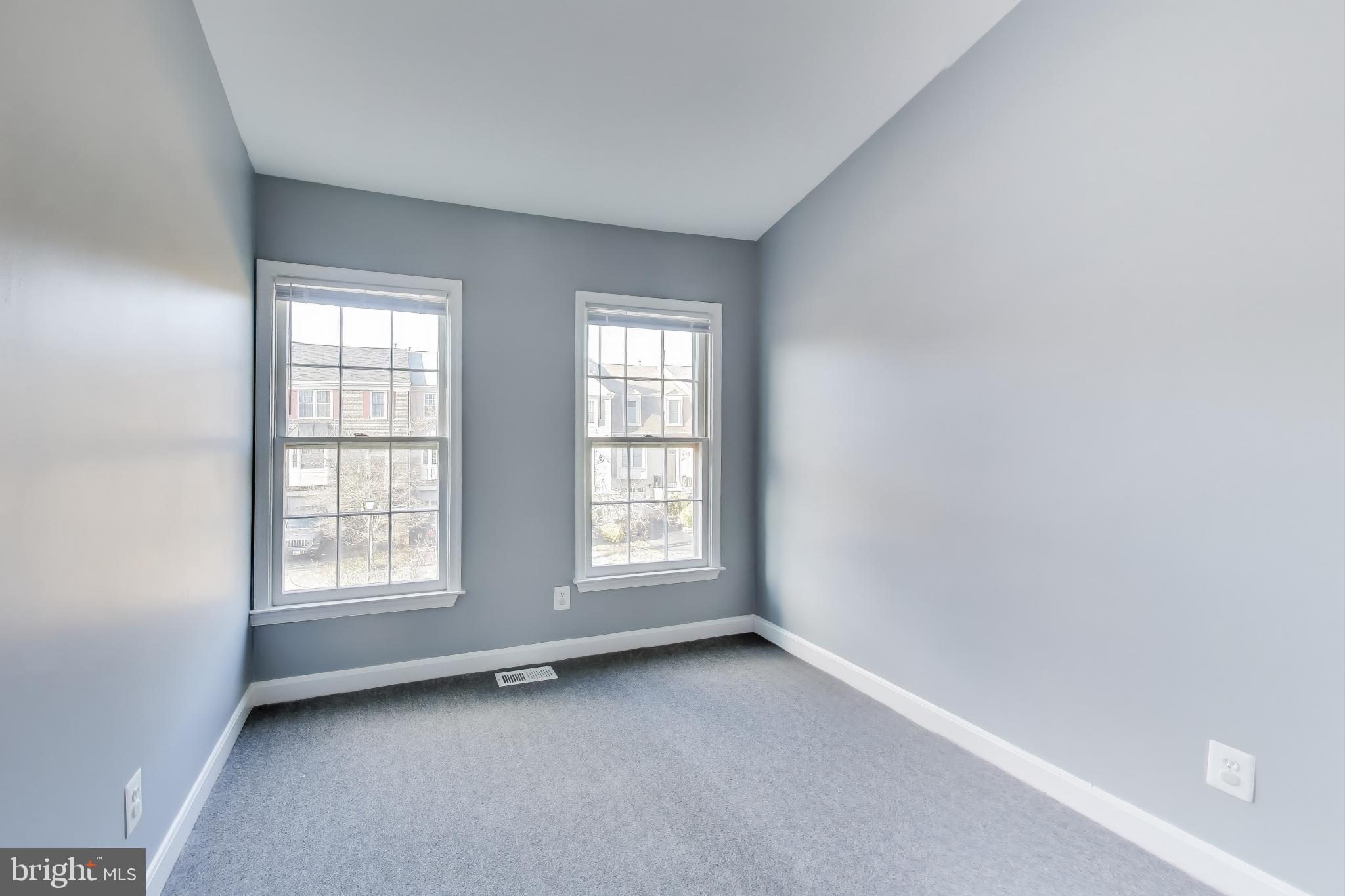 2851 Strauss Terrace Silver Spring, MD 20904 - Photo 21 of 34 an empty room with windows