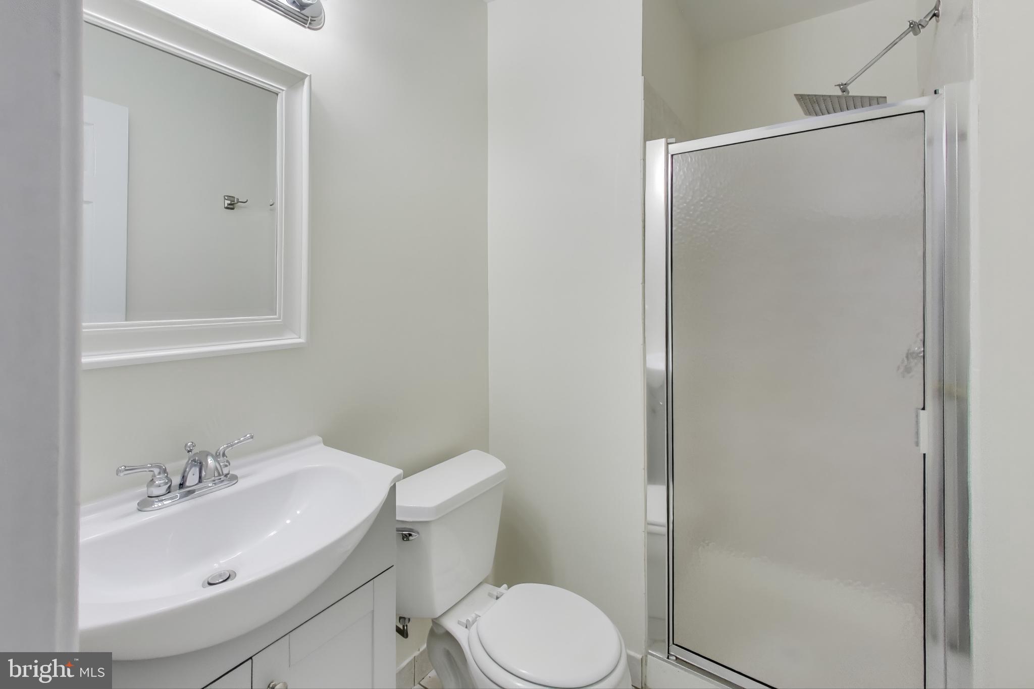 2851 Strauss Terrace Silver Spring, MD 20904 - Photo 29 of 34 a bathroom with a sink toilet and shower