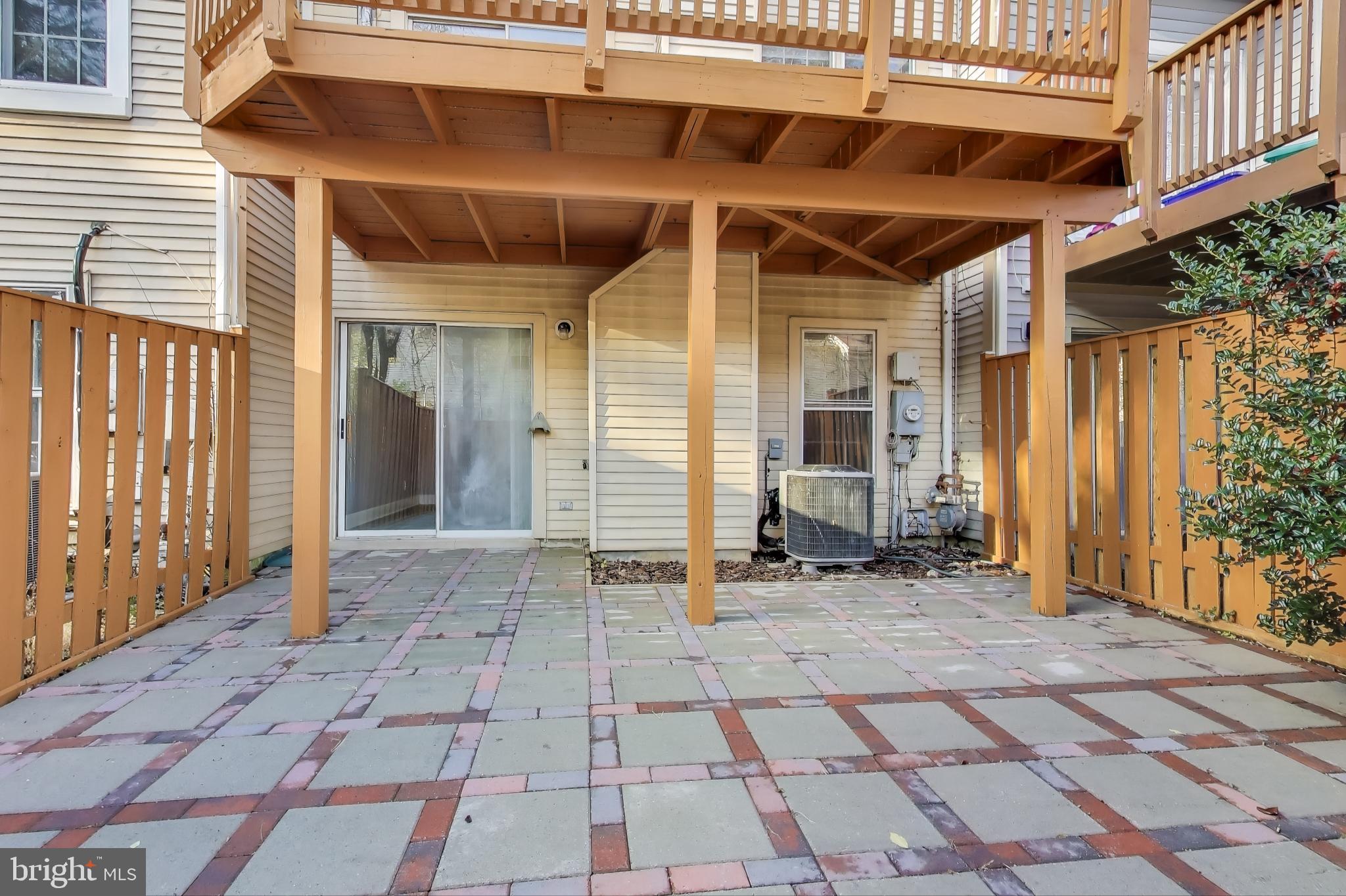 2851 Strauss Terrace Silver Spring, MD 20904 - Photo 33 of 34 a view of a wooden door with a table and chair