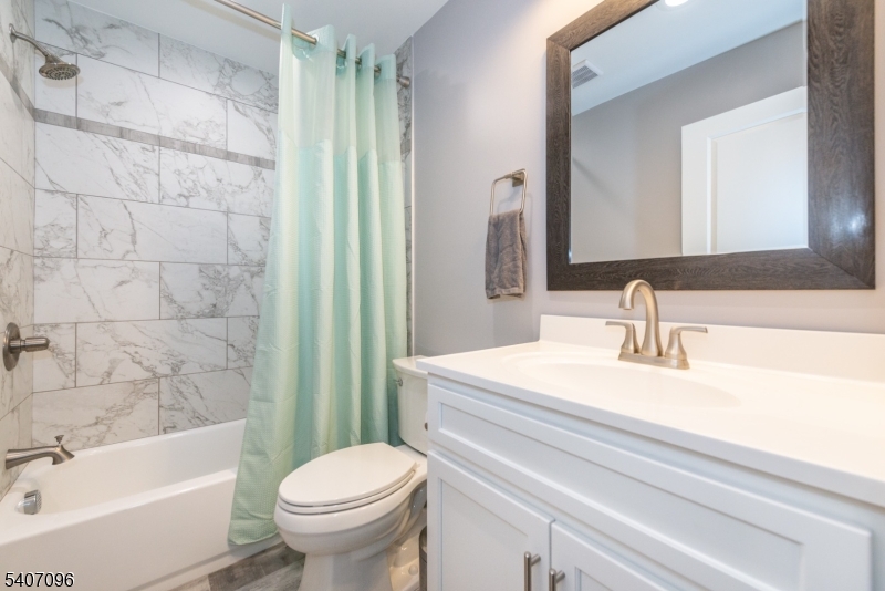 165 Lakeside Road West Milford, NJ 07421 - Photo 11 of 25 a bathroom with a sink toilet and shower