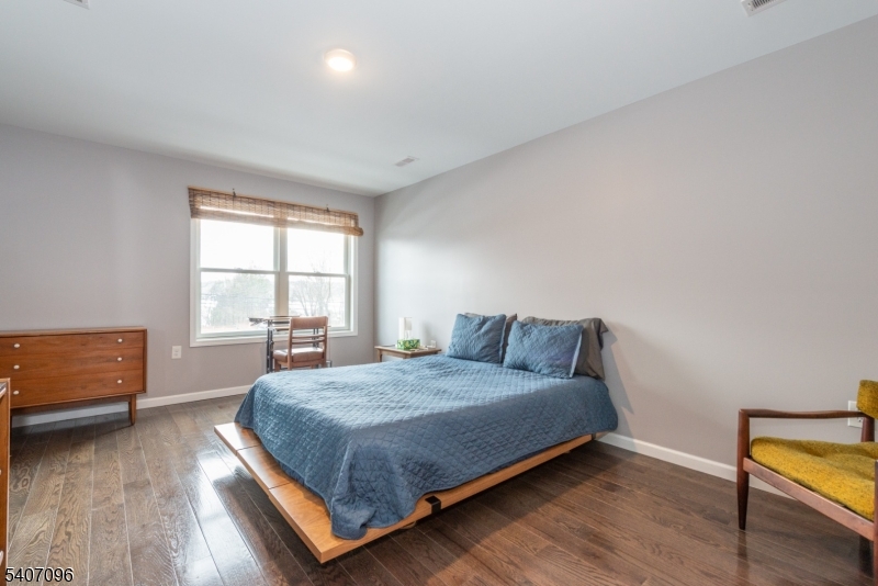 165 Lakeside Road West Milford, NJ 07421 - Photo 12 of 25 a bedroom with a bed and a window