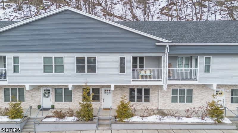 165 Lakeside Road West Milford, NJ 07421 - Photo 23 of 25 a house view that has a lot of windows