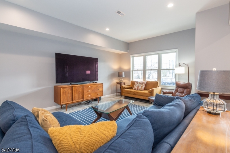 165 Lakeside Road West Milford, NJ 07421 - Photo 7 of 25 a living room with furniture and a flat screen tv