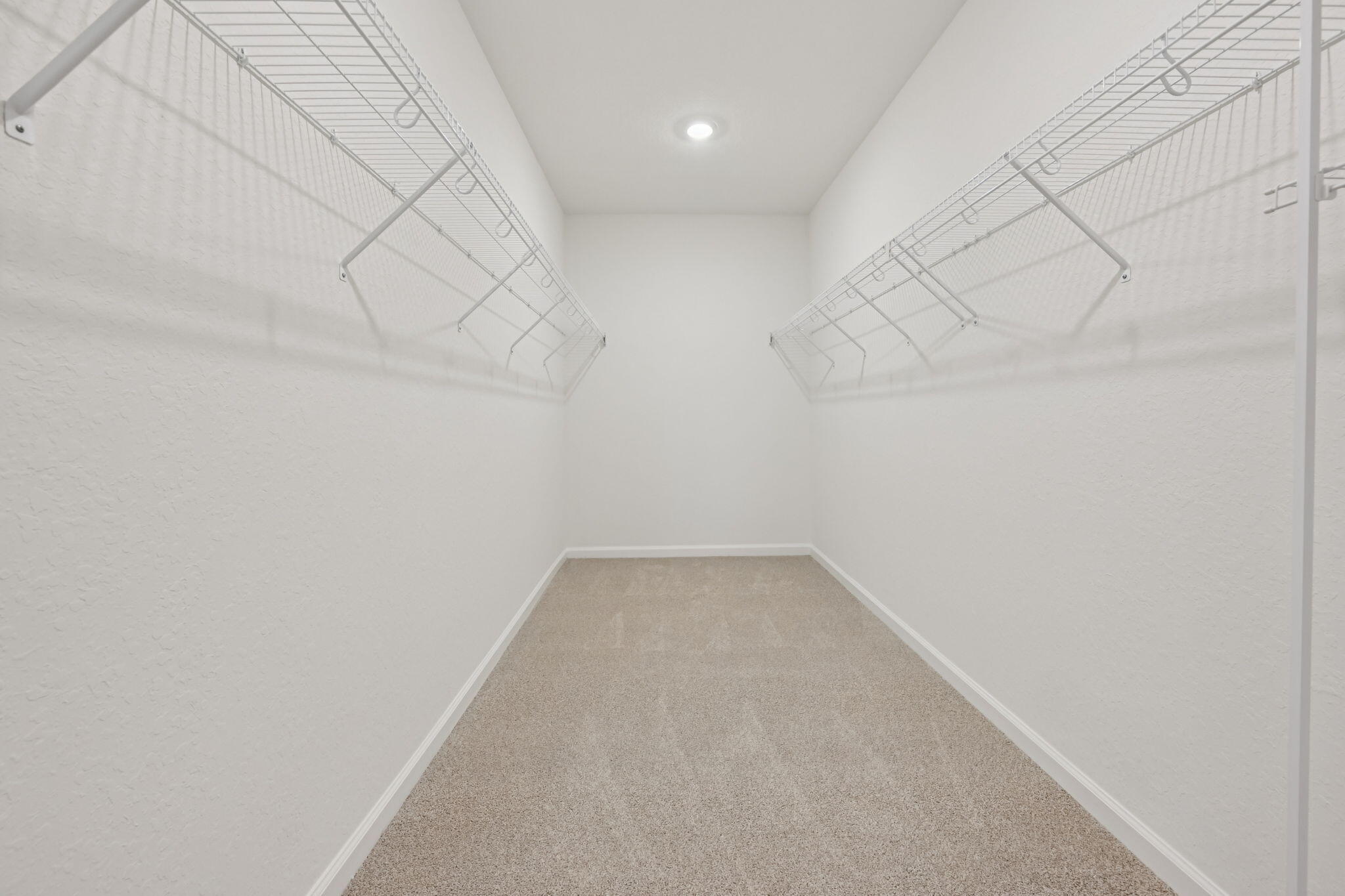 14211 Southwest New Dawn Road Indiantown, FL 34956 - Photo 18 of 37 a view of a room with racks on the wall
