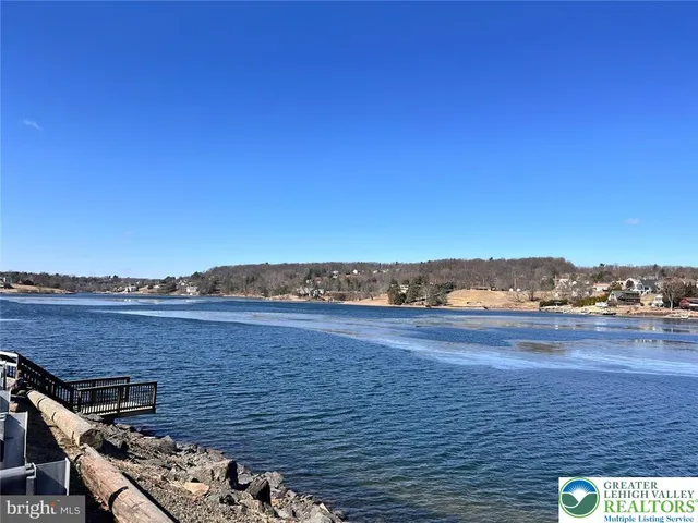 a view of an ocean with a city view