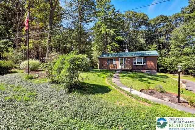 a house view with a garden space