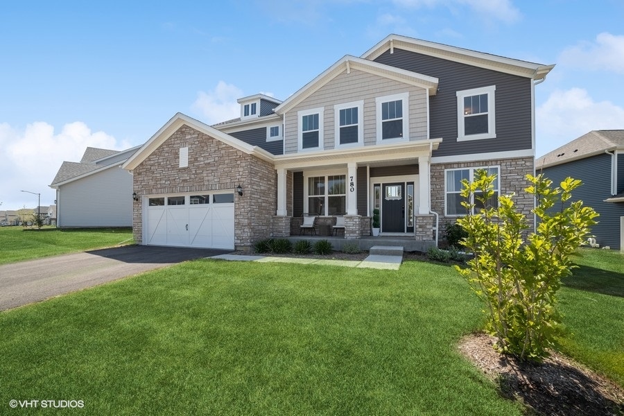 780 Treeline Drive Algonquin, IL 60102 - Photo 1 of 24 a front view of a house with a yard