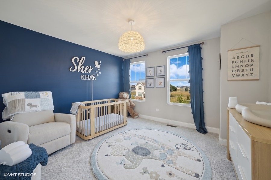 780 Treeline Drive Algonquin, IL 60102 - Photo 12 of 24 a living room with furniture and a window