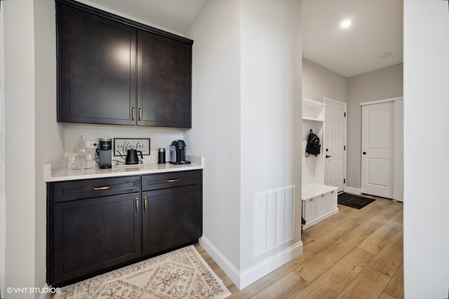 780 Treeline Drive Algonquin, IL 60102 - Photo 14 of 24 a kitchen with a sink and a refrigerator