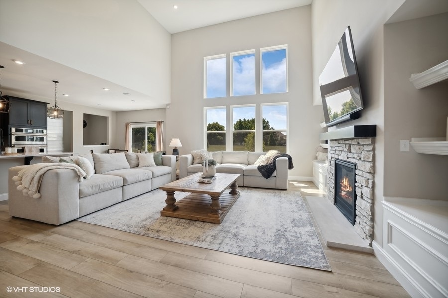 780 Treeline Drive Algonquin, IL 60102 - Photo 2 of 24 a living room with furniture fireplace and flat screen tv