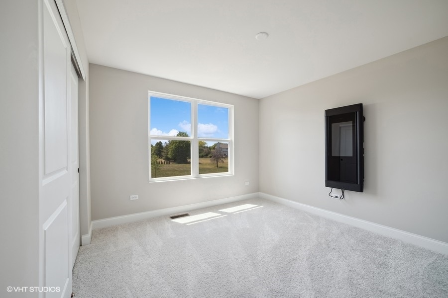 780 Treeline Drive Algonquin, IL 60102 - Photo 23 of 24 a view of an empty room with a window