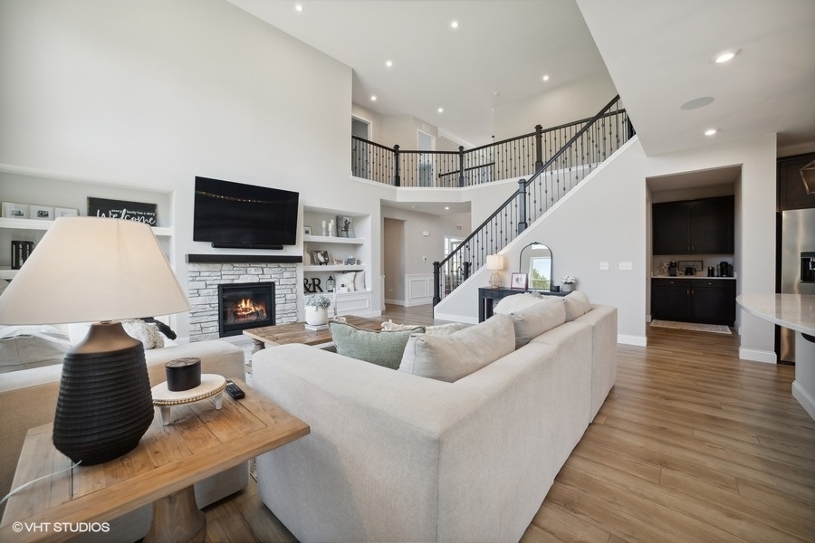 780 Treeline Drive Algonquin, IL 60102 - Photo 3 of 24 a living room with furniture fireplace and a flat screen tv