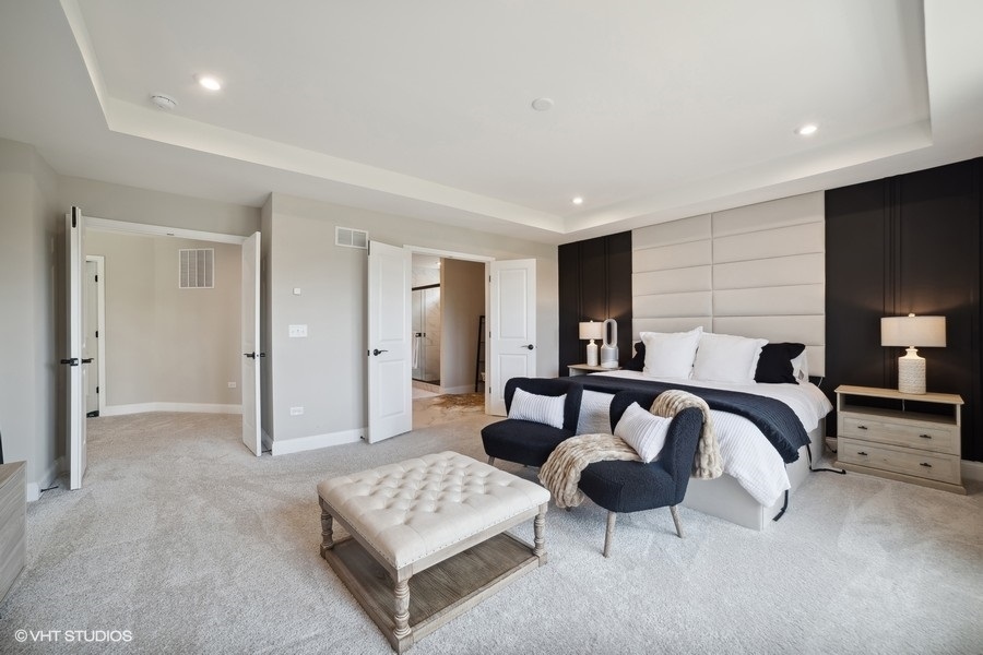 780 Treeline Drive Algonquin, IL 60102 - Photo 8 of 24 a spacious bedroom with a bed and lamp