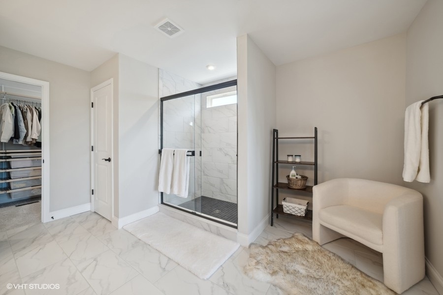 780 Treeline Drive Algonquin, IL 60102 - Photo 10 of 24 a spacious bedroom with a bed and a walk in closet