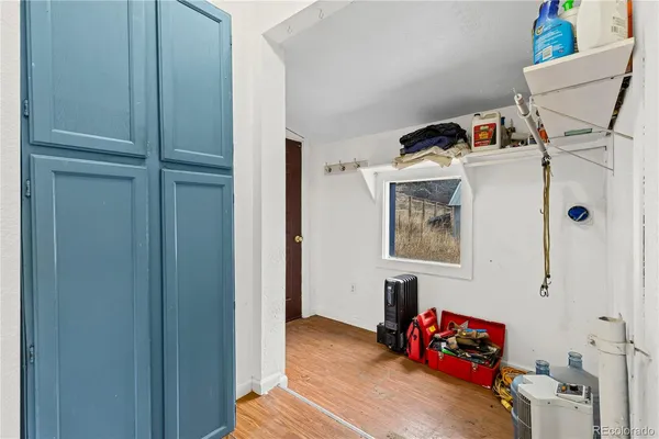 a utility room with baby toys