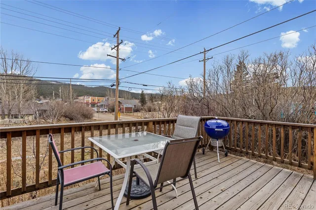 a view of a chairs on the roof deck