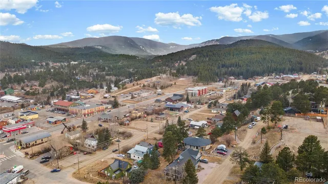 a view of lake with mountain