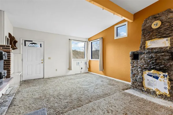 an empty room with windows