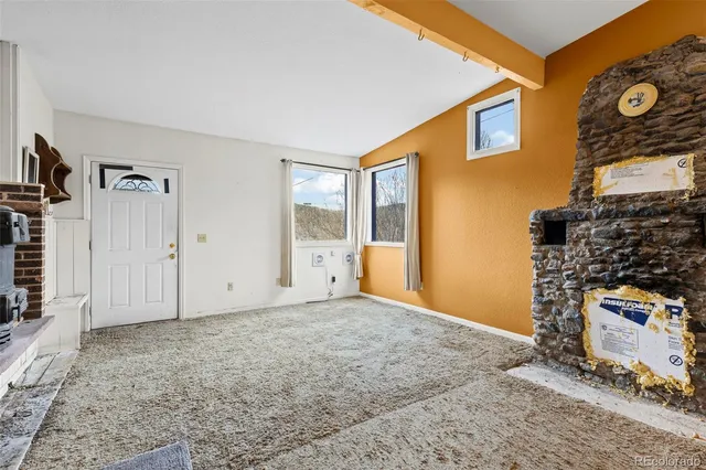 an empty room with windows