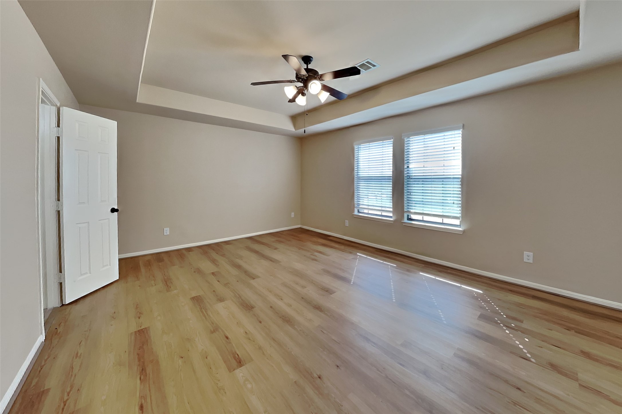 19715 Seabury Path Ct. Katy, TX 77449 - Photo 8 of 20 wooden floor in an empty room with a window
