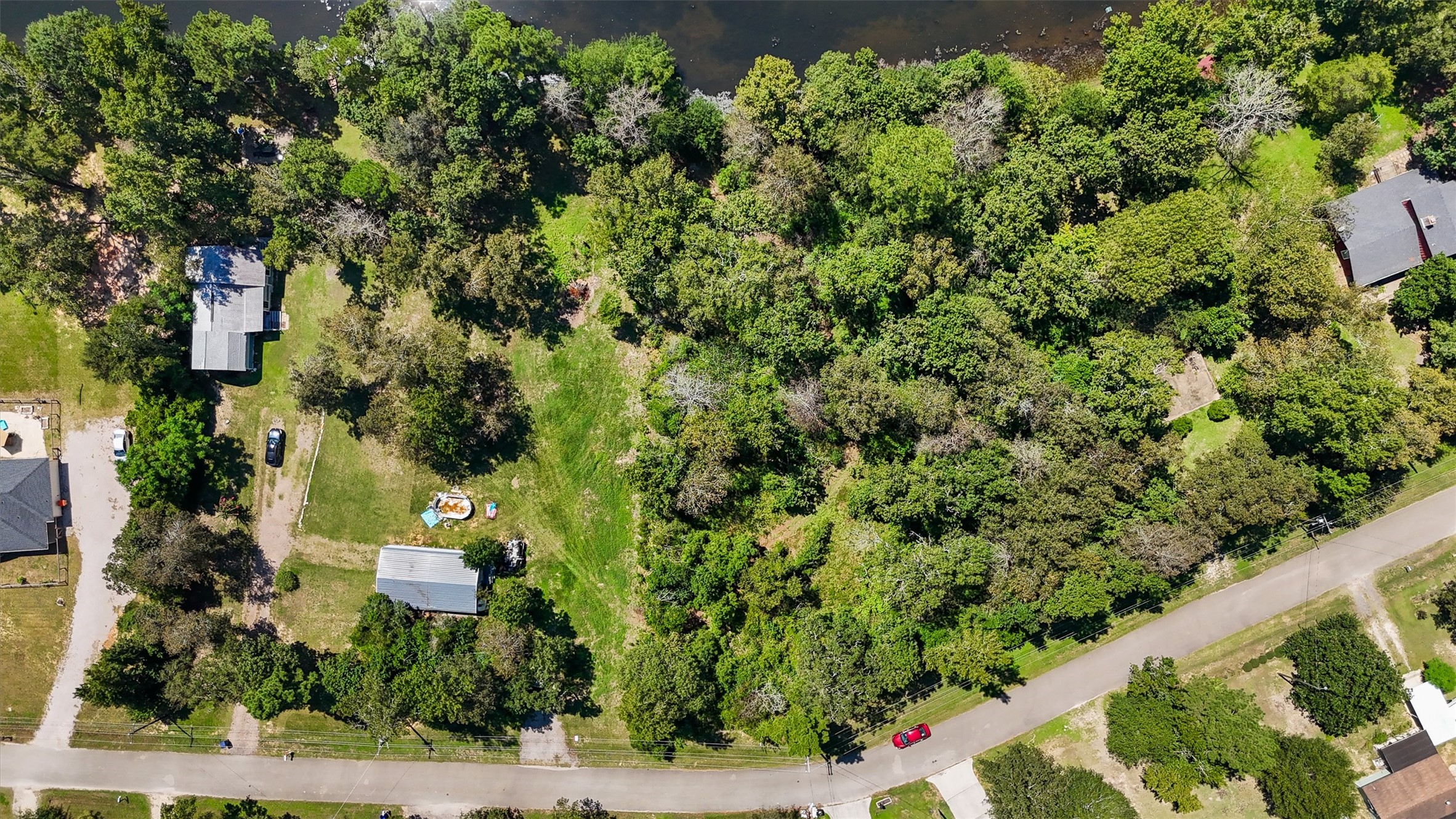 3816 Sam Houston Road Houston, TX 77002 - Photo 7 of 19 an aerial view of a house with a yard and garden