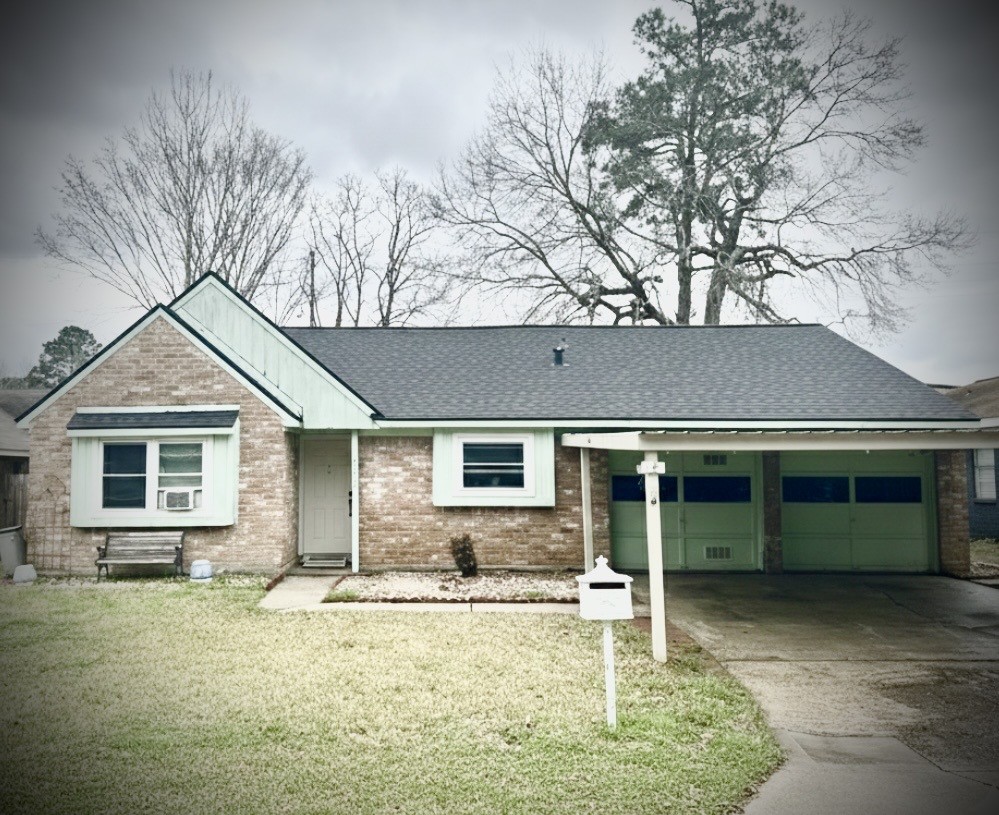 front view of a house with a yard