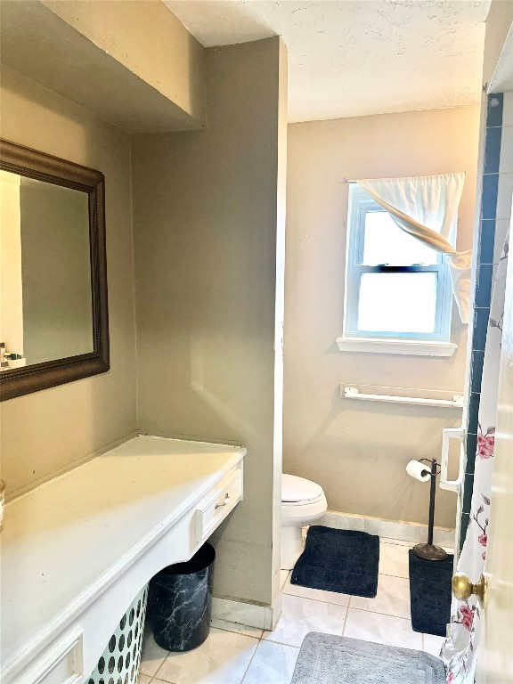 705 Phyllis Court Conroe, TX 77303 - Photo 13 of 17 a bathroom with a sink and a mirror