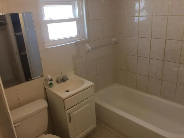 a bathroom with a sink and a bathtub